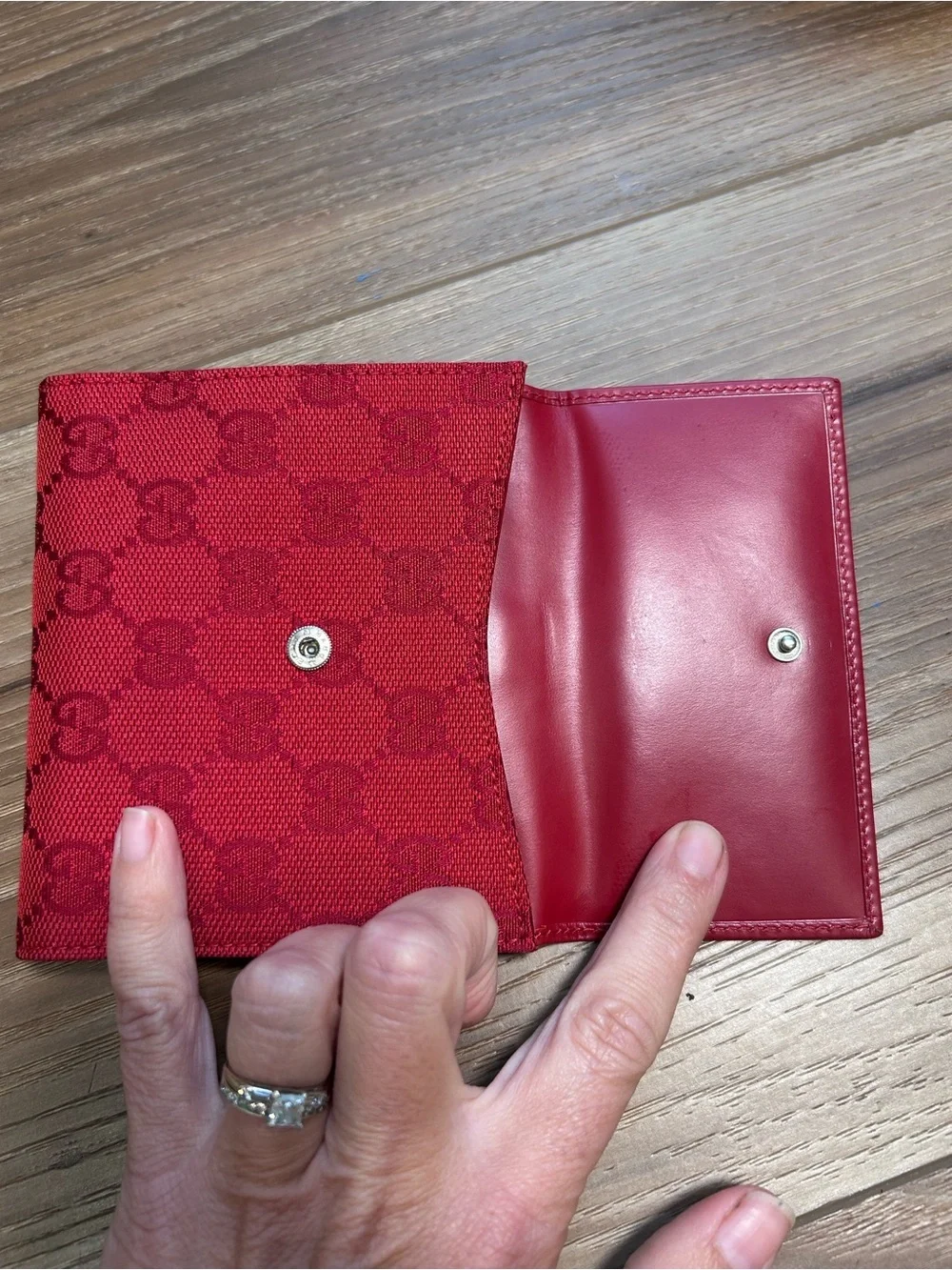 New in Box Gucci red Jackie monogram bifold wallet piston lock silver authentic
